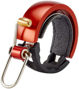 Knog Oi Luxe sonnette de vélo black/red